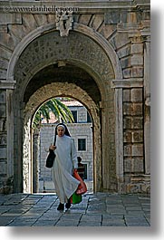 arches, archways, croatia, europe, korcula, nuns, religious, sequence, vertical, womens, photograph