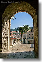 arches, archways, croatia, europe, korcula, palm trees, vertical, photograph