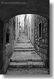 arches, archways, black and white, croatia, europe, korcula, stairs, under, vertical, photograph