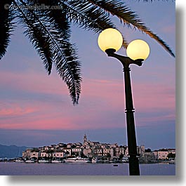 cityscapes, croatia, europe, korcula, lamp posts, palmtree, slow exposure, square format, sunsets, water, photograph