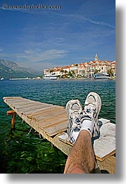 cityscapes, croatia, dock, europe, feet, korcula, townview, vertical, water, photograph
