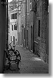 bicycles, black and white, croatia, europe, korcula, narrow streets, parked, vertical, photograph
