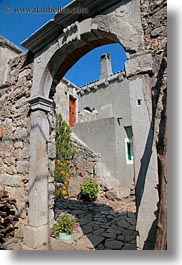 archways, croatia, doors, europe, flowers, lubenice, structures, vertical, photograph