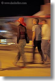 croatia, europe, hats, mali losinj, motion blur, red, slow exposure, vertical, walking, womens, photograph
