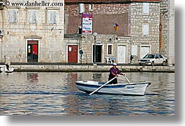 boats, croatia, europe, horizontal, men, milna, rowing, towns, water, photograph
