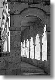 archways, black and white, buildings, cloisters, croatia, europe, milna, vertical, photograph