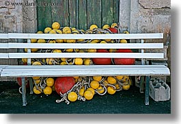 benches, croatia, europe, floaters, horizontal, milna, red, yelllow, photograph