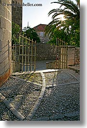 cobblestones, croatia, europe, gates, milna, sidewalks, vertical, photograph