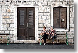 benches, buildings, croatia, dogs, doors, europe, horizontal, milna, people, windows, womens, photograph
