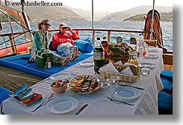 boats, couples, croatia, europe, foods, horizontal, lunch, nostalgija, tables, water, photograph