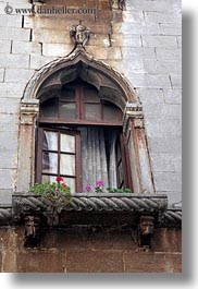 archways, croatia, europe, flowers, gothic, porec, structures, vertical, windows, photograph