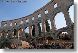amphitheater, architectural ruins, archways, buildings, cloisters, croatia, europe, horizontal, pula, roman, structures, photograph