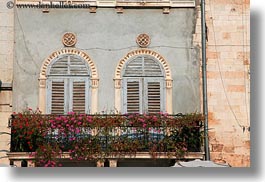 archways, croatia, europe, flowers, horizontal, pula, structures, windows, photograph