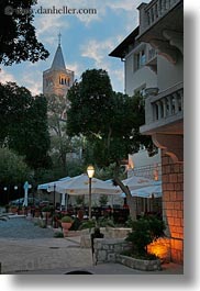 arbiana hotel, bell towers, croatia, dining, dusk, europe, rab, tents, vertical, photograph