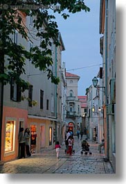 croatia, dusk, europe, glow, lights, narrow, rab, streets, trees, vertical, photograph