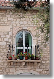 archways, balconies, croatia, europe, plants, rab, structures, vertical, windows, photograph