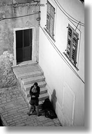 black and white, couples, croatia, europe, hugging, narrow streets, people, rovinj, slow exposure, streets, vertical, photograph