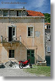 buildings, croatia, europe, motorcycles, red, sipan, vertical, photograph