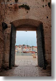 archways, buildings, croatia, doors, europe, harbor, structures, trogir, vertical, photograph