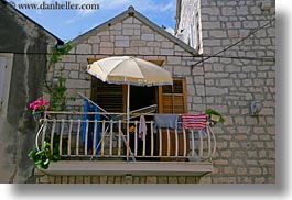 balconies, croatia, display, europe, horizontal, trogir, umbrellas, windows, photograph