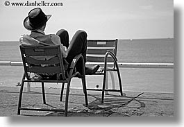 black and white, chairs, cowboys, europe, france, horizontal, nice, ocean, seas, watching, photograph