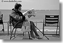 black and white, chairs, europe, france, horizontal, newspaper, nice, ocean, old, womens, photograph