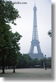 buildings, eiffel tower, europe, france, haze, hazy, paris, structures, towers, trees, vertical, photograph