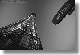 black and white, buildings, eiffel tower, europe, france, glow, horizontal, lights, north, paris, perspective, signs, structures, towers, upview, photograph
