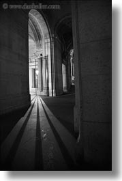 arches, black and white, europe, france, lights, louvre, paris, shadows, vertical, photograph