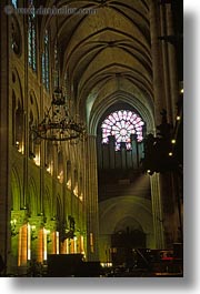 archways, churches, europe, france, glow, lights, materials, notre dame, paris, stained glass, vertical, photograph