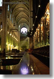 archways, churches, europe, france, glow, lights, notre dame, paris, vertical, photograph