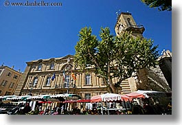 aix en provence, blues, buildings, city hall, clock tower, colors, europe, france, horizontal, market, provence, structures, towers, trees, umbrellas, photograph