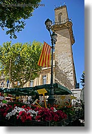 aix en provence, clock tower, colorful, colors, europe, flags, flowers, france, nature, provence, vertical, photograph