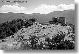 bargeme, black and white, buildings, castles, europe, france, hikers, hiking, horizontal, materials, people, provence, stones, structures, photograph
