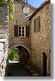 arches, archways, bargeme, europe, france, lamps, materials, provence, stones, structures, tunnel, vertical, photograph