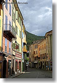 buildings, castellane, colorful, colors, europe, france, provence, towns, vertical, photograph