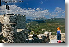 blues, castles, chateau trigance, clothes, colors, europe, flags, france, green, hats, horizontal, materials, nature, oranges, provence, scenics, stones, photograph