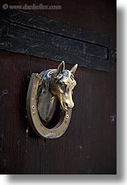browns, colors, doors, europe, fayence, france, heads, horses, knockers, provence, vertical, photograph