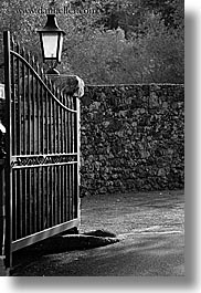 black and white, europe, france, gates, hotel des messugues, irons, lamps, materials, provence, vertical, photograph