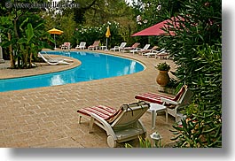 chairs, colors, europe, france, green, horizontal, hotel des messugues, nature, pools, provence, recliner, water, photograph