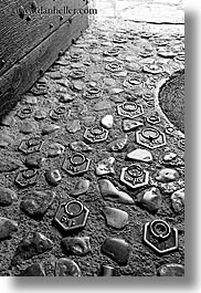 black and white, cobblestones, europe, floors, france, irons, materials, moulin de camandoule, provence, stones, vertical, weights, photograph