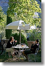 breakfast, clothes, colors, couples, europe, france, green, hotels, moustiers, provence, st marie, vertical, photograph