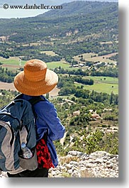 backpack, clothes, colors, europe, france, hats, landscapes, moustiers, oranges, provence, scenics, st marie, vertical, viewing, womens, photograph