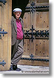 doors, europe, france, gothic, men, old, people, provence, vertical, photograph