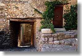 doors, europe, france, horizontal, ivy, materials, nature, plants, provence, seillans, stones, tunnel, photograph