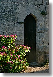 arches, archways, colors, doors, europe, flowers, france, green, materials, nature, provence, seillans, stones, structures, vertical, photograph