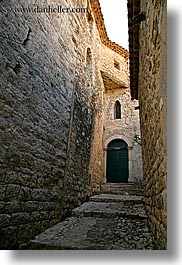 alleys, cobblestones, doors, europe, france, green, materials, narrow, provence, seillans, stones, vertical, photograph