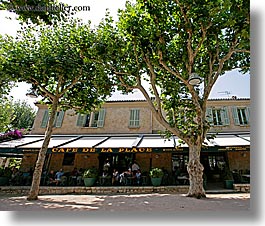 cafes, europe, france, horizontal, nature, plants, provence, st paul, trees, umbrellas, photograph