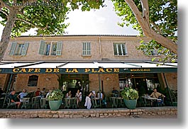 cafes, europe, france, horizontal, nature, plants, provence, st paul, trees, umbrellas, photograph