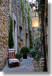 chairs, cobblestones, europe, france, materials, narrow, provence, st paul, stones, streets, vertical, photograph